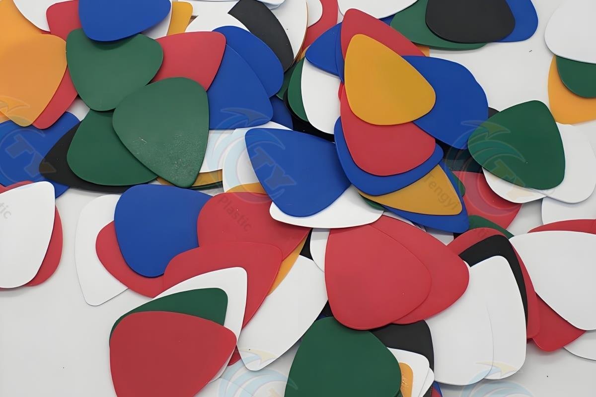 Colorful guitar picks cut from POM thin sheets